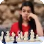 Girl playing chess in a bench